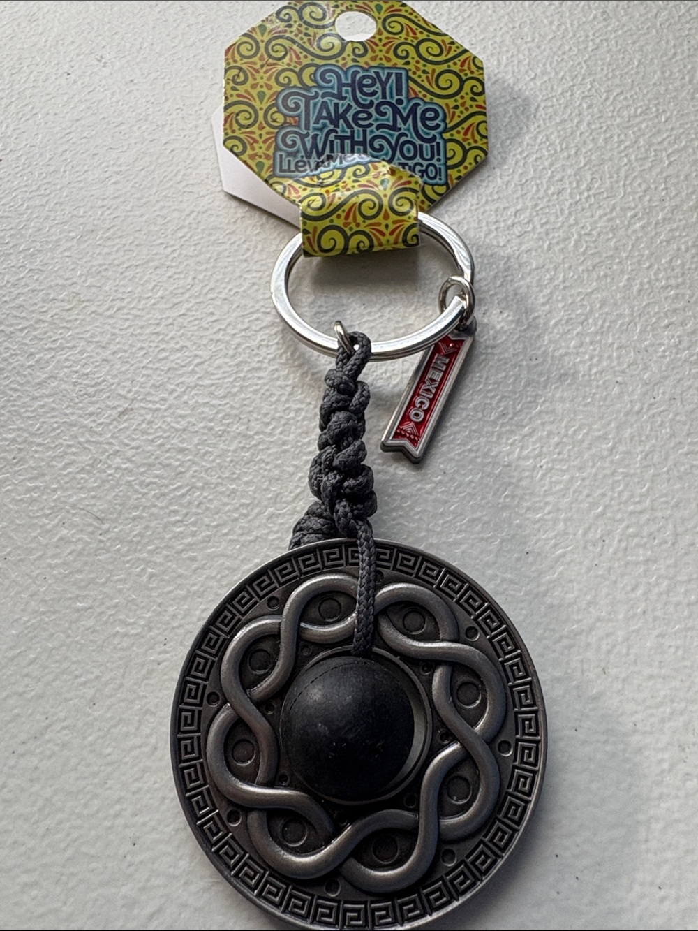 Black Braided Keychain with Decorative Medallion